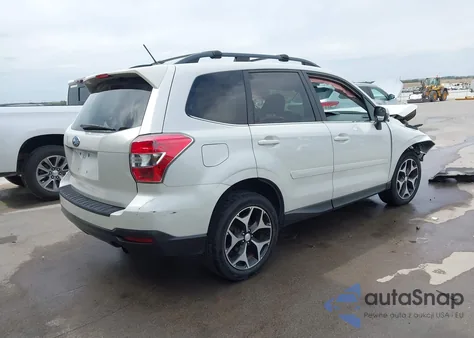 2014 Subaru Forester 2.0Xt Touring z USA, uszkodzony, nr VIN JF2SJGMC4EH548256